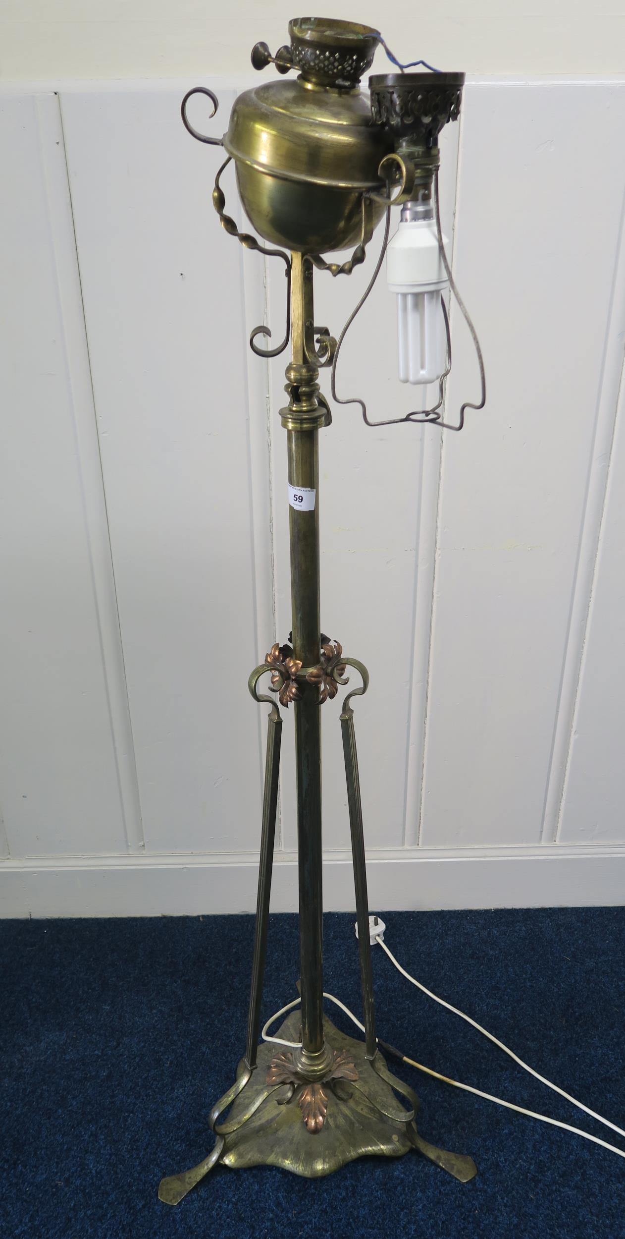 A Victorian brass oil standard lamp converted to electric Condition Report:Available upon request