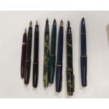 Eight vintage fountain pens, the majority with 14k nibs  Condition Report:Available upon request