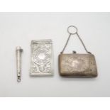 A Victorian silver card case with eastern style engraved knotwork decoration with a blank