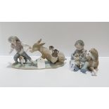 A Lladro group New Playmates and another of a boy and Mule Condition Report:Available upon request