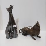 A sculpture of a cat and a pottery group of a cat Condition Report:Available upon request