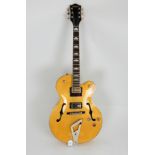 A Gretsch Streamliner G2420 arch top electric guitar in Village Amber, serial number IS210726683