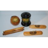 Six various items Mauchline ware compromising two spectacle cases, two thread cases and two rules