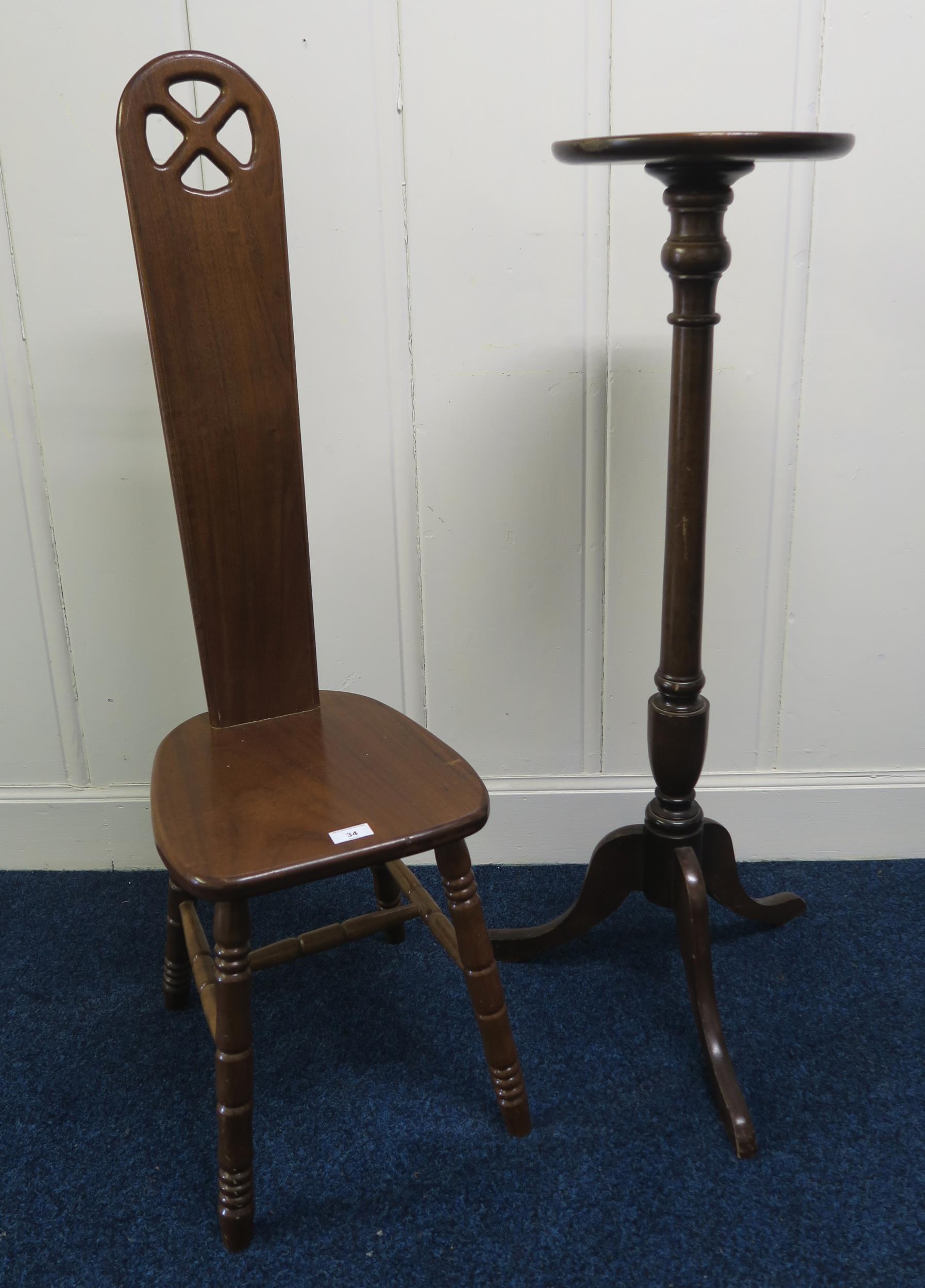 A 20th century mahogany spinning chair and a 20th century mahogany circular topped torchiere