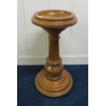 A 20th century pine font, 75cm high x 39cm diameter Condition Report:Available upon request
