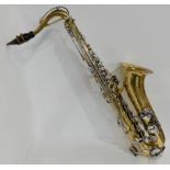 A Melody Maker tenor saxophone bearing the Selmer S harp logo serial number 65505 with case