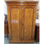 A Victorian mahogany two door wardrobe, 211cm high x 148cm wide x 64cm deep Condition Report: