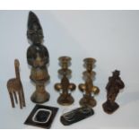 A carved African figure, pair of brass candlesticks, vintage spectacles etc  Condition Report: