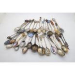 A collection of silver and enamel souvenir/city spoons, some stamped Sterling, 800, 930, other