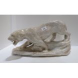 A large crackle glaze model of a lion Condition Report:Available upon request