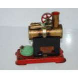 A Mamod steam engine, 13cm wide Condition Report:Available upon request