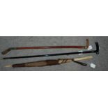 A walking cane, riding crop with horn handle and bone handle parasol, (damaged) (3) Condition