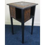 An early 20th century ebonised table with carved oak panels Condition Report:Available upon request