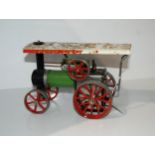 A Mamod steam tractor engine, 25cm wide Condition Report:Available upon request