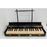 A Jevons Practise Keyboard, Manufactured by Joseph Williams Ltd London featuring 39 keys in a