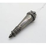 A Victorian silver whistle, the top and the faceted tapered case cast with oak leaves and acorns, by