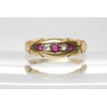 An 18ct gold red gem and diamond ring, size O, weight 3.4gms Condition Report:Available upon