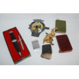 An AA car mascot, table lighter, modern skean dhu, miniature bible etc Condition Report:Available