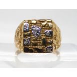 A 9ct gold gents diamond set dress ring, size Z, weight 6.3gms Condition Report:Available upon