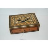 An Anglo Indian inlaid casket with hinged lid and fitted interior with mirror, 20cm wide Condition