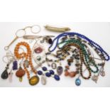 A collection of gem beads to include malachite, amber, pearls, tiger's eye etc, silver gem set