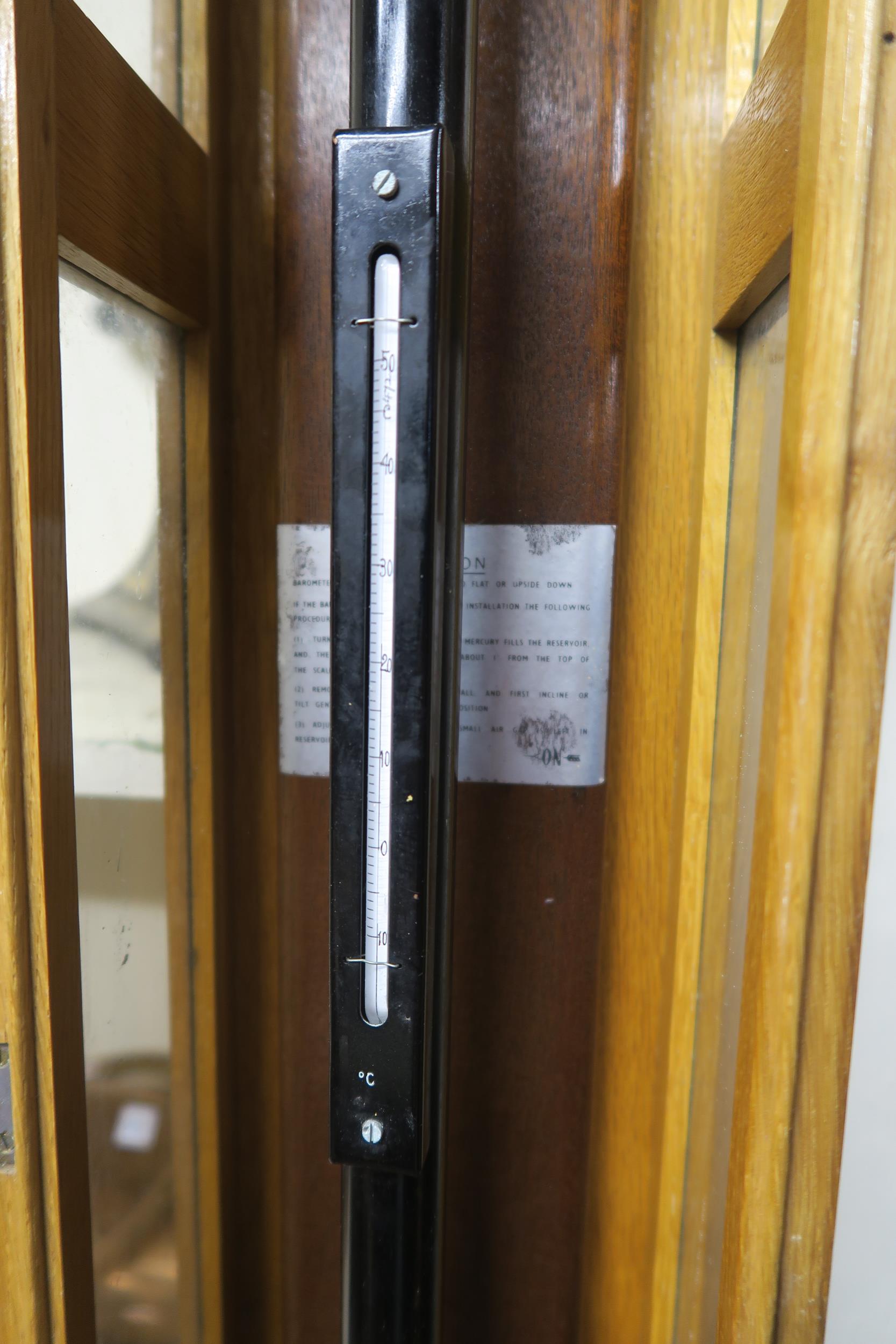 A 20th century cased Philip Harris Ltd barometer, 122cm high Condition Report:Available upon - Image 3 of 5