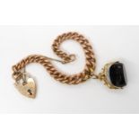 A 9ct rose gold tapered curb chain, hallmarked to every link, with heart clasp and onyx swivel