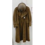 A Royal Engineers military greatcoat and a WW2 steel helmet Condition Report:Available upon request