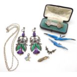 A pair of Arts & Crafts white metal amethyst and chalcedony earrings, enamelled silver swallow