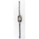 A white gold plated Elgin Art Deco watch, set with two diamonds with an estimated approx. total of