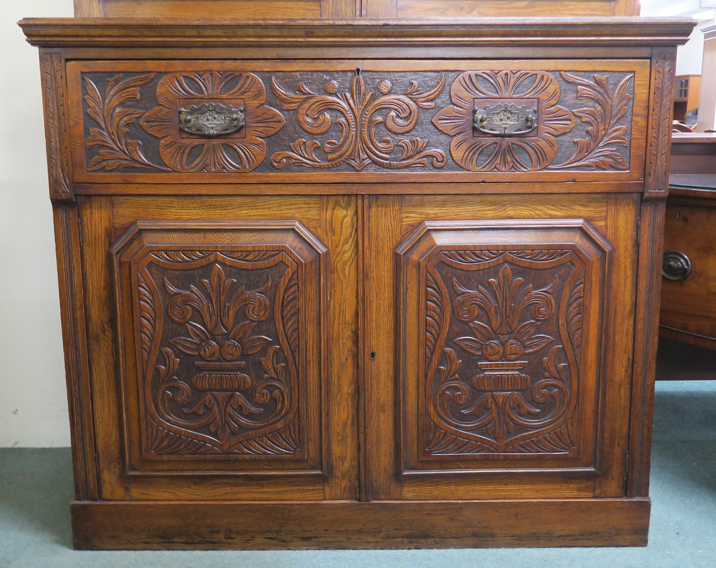 A Victorian oak secretaire bookcase with glazed two door bookcase above single drawer secretaire - Image 2 of 3