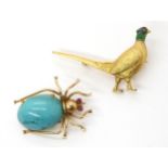 A 9ct gold and enamel pheasant brooch, together with a yellow metal spider brooch set with turquoise