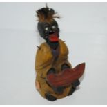 A Japanese Kobe style mechanical wooden toy of boy eating water melon, 16cm high and various