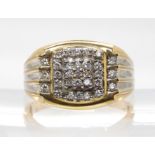 A 14k gold diamond set gents ring, size 3, set with estimated approx 0.60cts of brilliant cut
