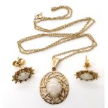 A pair of retro 9ct gold opal earrings, together with a similar pendant, length 2.8cm with bail,