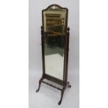 An early 20th century mahogany bevelled glass cheval mirror turned stretched base, 164cm high x 58cm