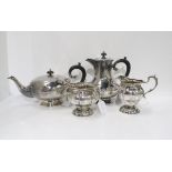 A four piece EPNS tea service, comprising tea pot, coffee pot, milk jug and twin handled sugar bowl,