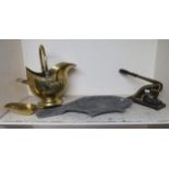 A Victorian brass helmet form coal scuttle, cast iron seal press and a lead bird bath (3)