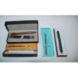 A Tiffany & Co Sterling silver pen in original case, Sheaffer pen, Everysharp pencil etc
