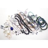 A collection of gemstone beads, to include amethyst, lapis lazuli and pearls, and further gemset