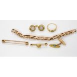 A collection of gold and yellow metal items to include a 15ct watch strap weight 7.2gms, a 9ct bar