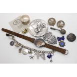 A Danish white metal mirror, a Mull silver trinket pot, silver clan brooches, a silver Sydney & Co