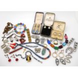 A collection of vintage costume jewellery, to include boxed earrings, buckles, dress clips and other