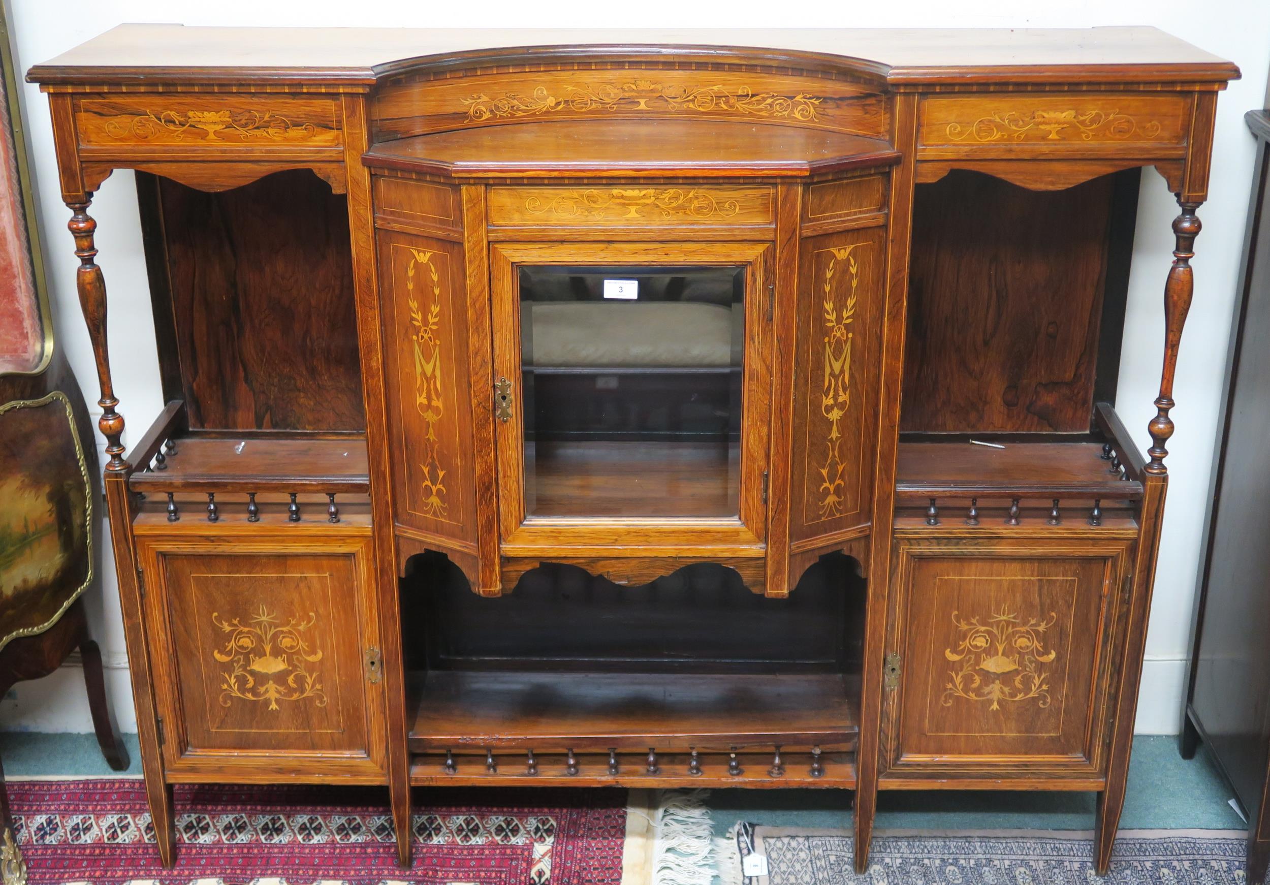 A Victorian rosewood and satinwood inlaid credenza with single glazed door flanked by cabinet