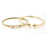 Two 9ct gold bangles, weight together 8.5gms  Condition Report:Available upon request