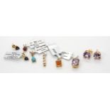 Five 9ct gold gem set pendants to include fire opal, ametrine both with diamond accents and a