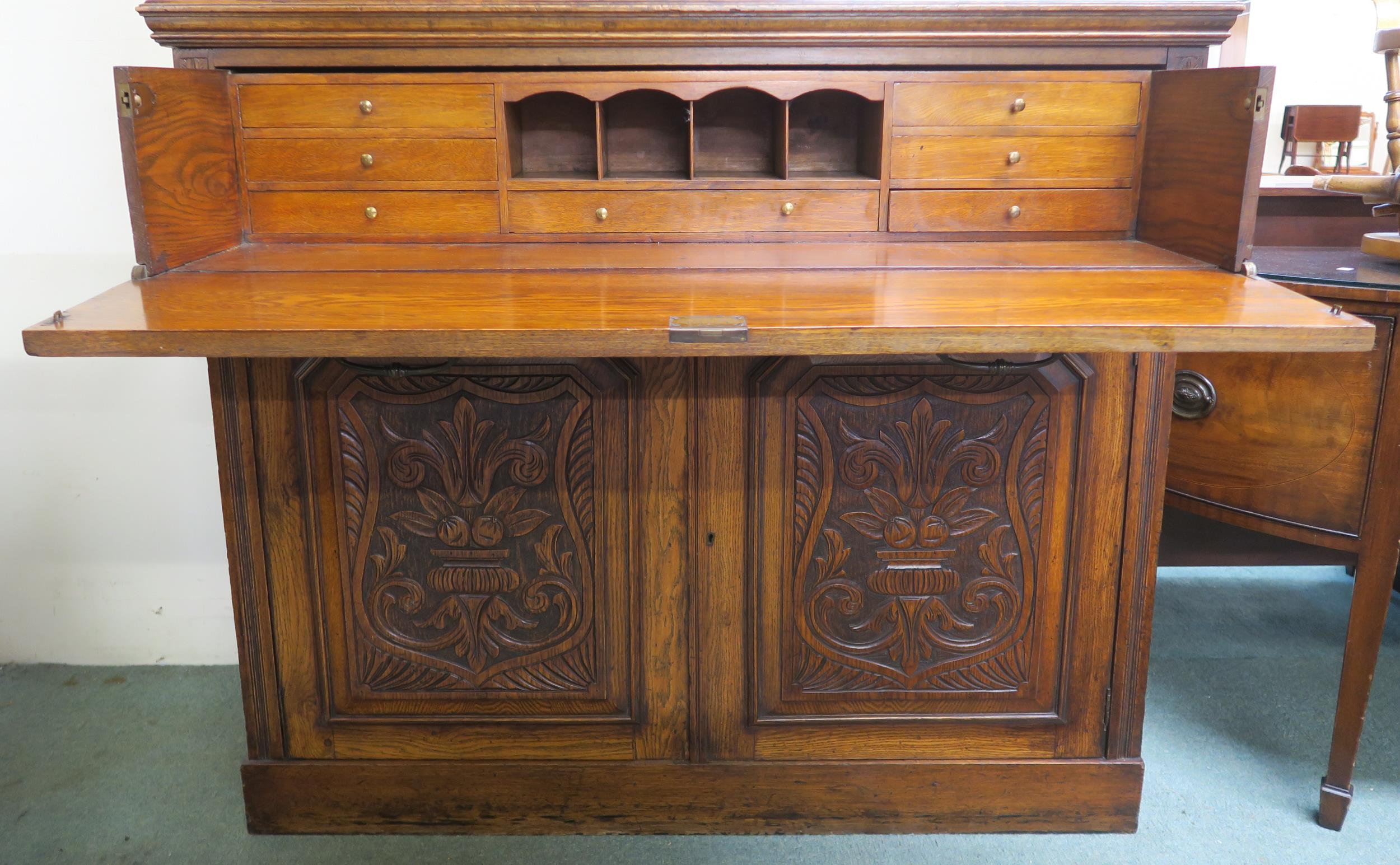 A Victorian oak secretaire bookcase with glazed two door bookcase above single drawer secretaire - Image 3 of 3