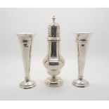 A silver sugar caster, of baluster form with scrolling pierced cover, by S. Blanckensee & Sons,