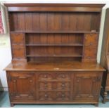 A 20th century oak Jacobean style dresser sideboard, 195cm high x 186cm wide x 55cm deep Condition