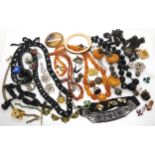 Two strings of faceted amber beads, weight 74gms, a pair of retro cufflinks, a beaded choker and